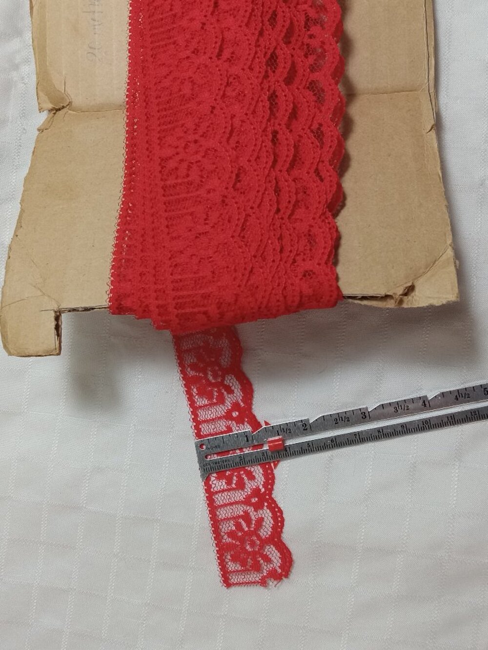 20 meters x 1 1/4 inches of brand-new, non-stretch vintage red lace ribbon